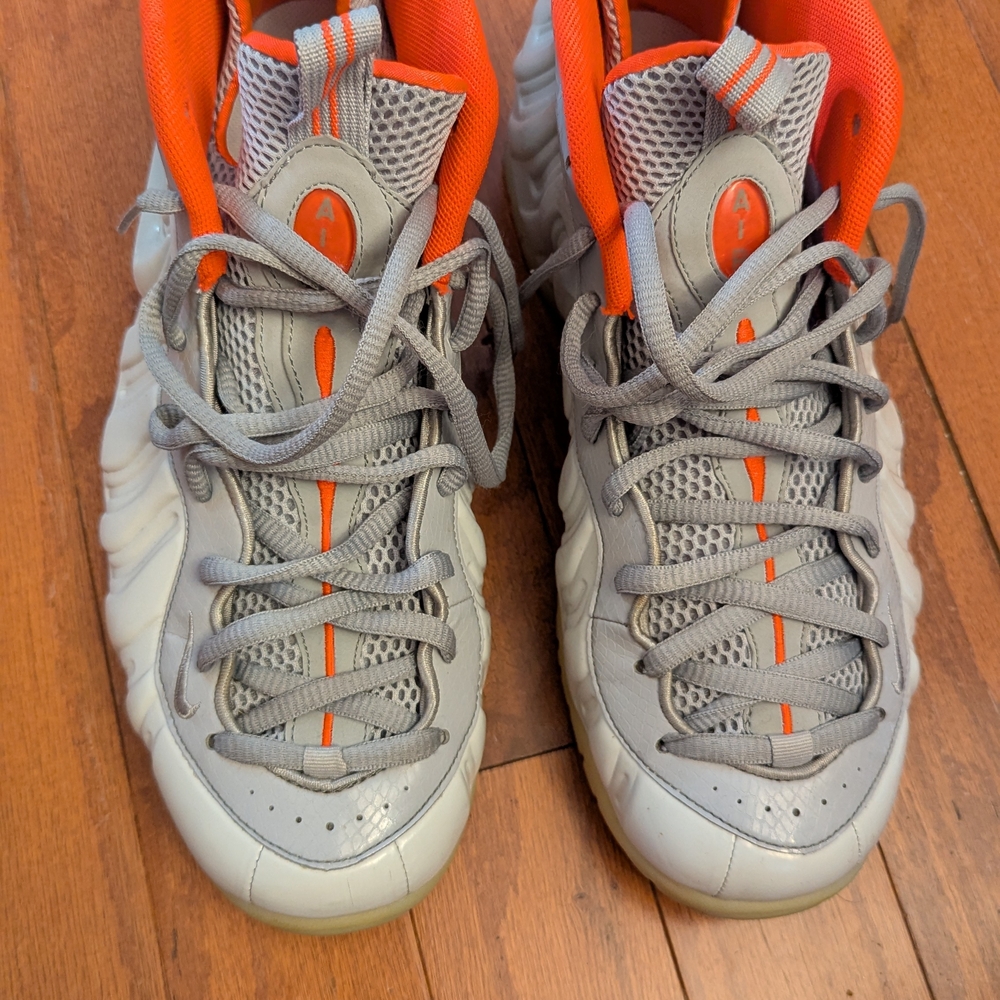 Nike Gray and Orange Athletic Shoes with Chunky Silhouette. Air Foamposite